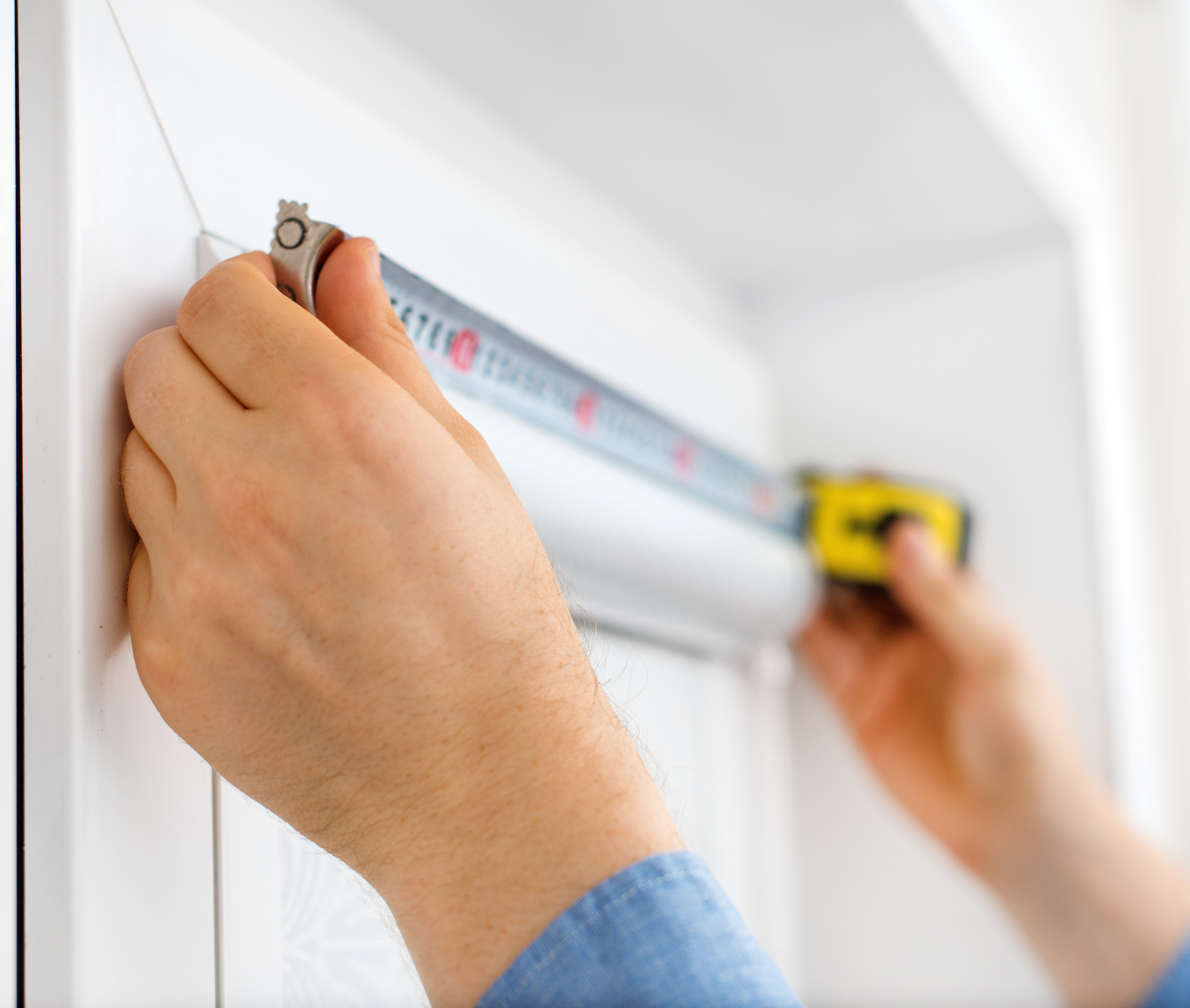 Ausmessen für passgenaue neue Fenster